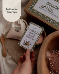 Behind The Trees - Mini potion kit for courage with cards and packaging labeled 'Dragon Tales'. The Little Potion Co - Mini Potion Kit - Dragon Tales
