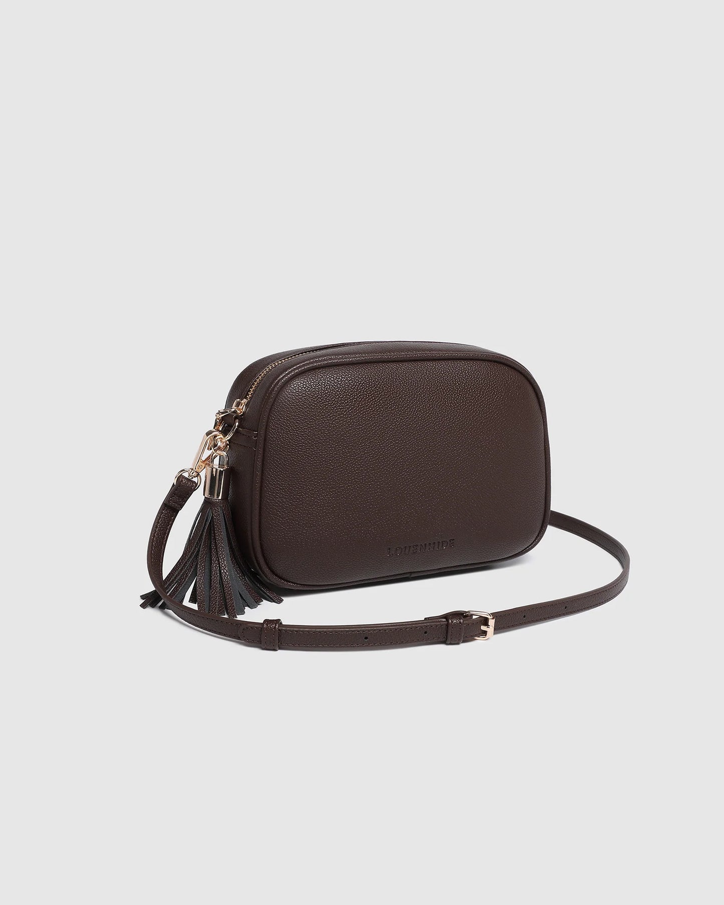 Behind The Trees - Brown crossbody bag on a light gray background - Louenhide - Jacinta Gia Crossbody Bag - Chocolate