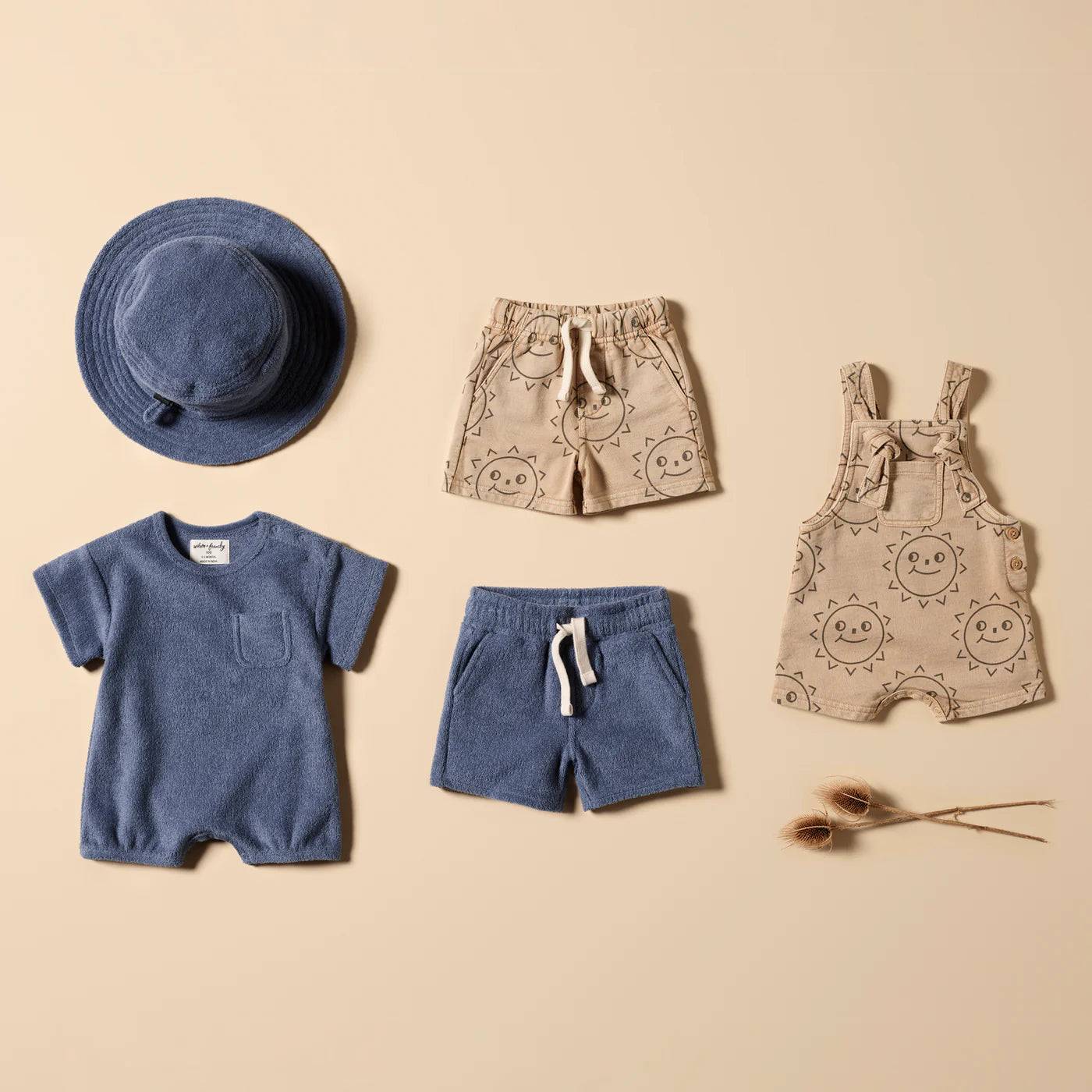 Behind The Trees - Blue baby romper with a pocket on a white background - Wilson + Frenchy - Organic Terry Growsuit - Deep Blue