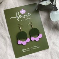 Behind The Trees - Green and purple earrings on a card with 'Foxy Collective' branding. - Foxie Collective - Marlie Earrings - Olive & Lilac