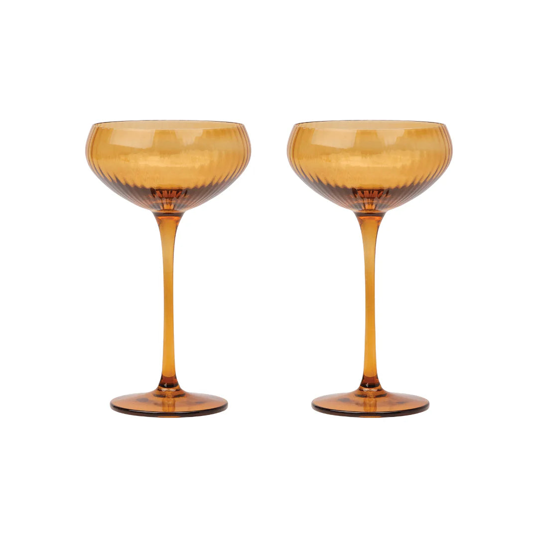 Behind The Trees - Two amber-colored cocktail glasses on a white background - Here's How - Coupe Glasses - The Lou - Set of 2 - Amber