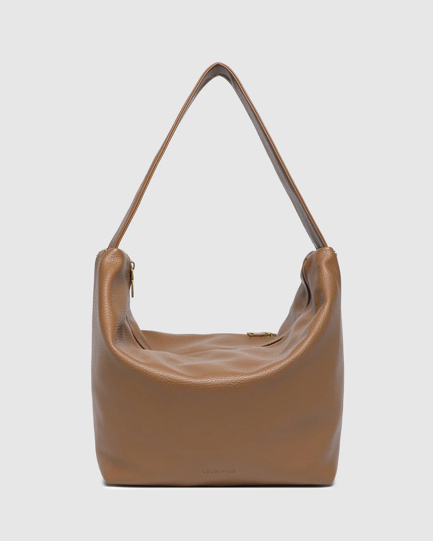 Behind The Trees - Brown leather handbag on a light gray background - Louenhide - Morgan Shoulder Bag - Caramel