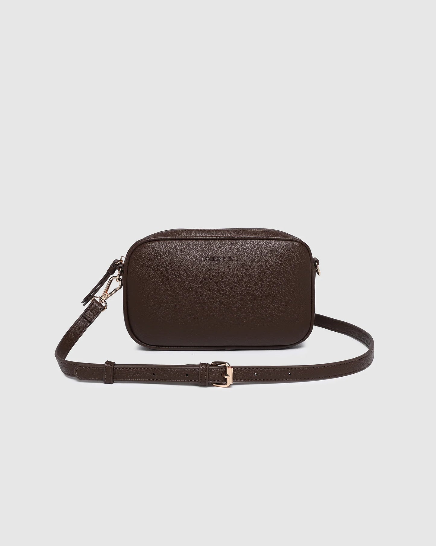 Behind The Trees - Brown leather crossbody bag on a light gray background - Louenhide - Bianca Crossbody Bag - Chocolate