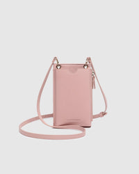 Behind The Trees - Pink crossbody phone pouch on a light gray background - Louenhide - Suki Phone Bag - Dusty Pink