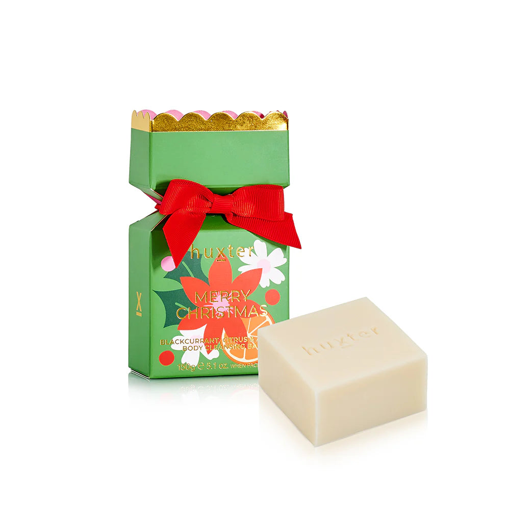 Behind The Trees - Holiday-themed soap packaging with a bar of soap on a white background - Huxter - Body Cleansing Bar Soap Bon Bon 150gm – Blackcurrant, Citrus & Amber - Green