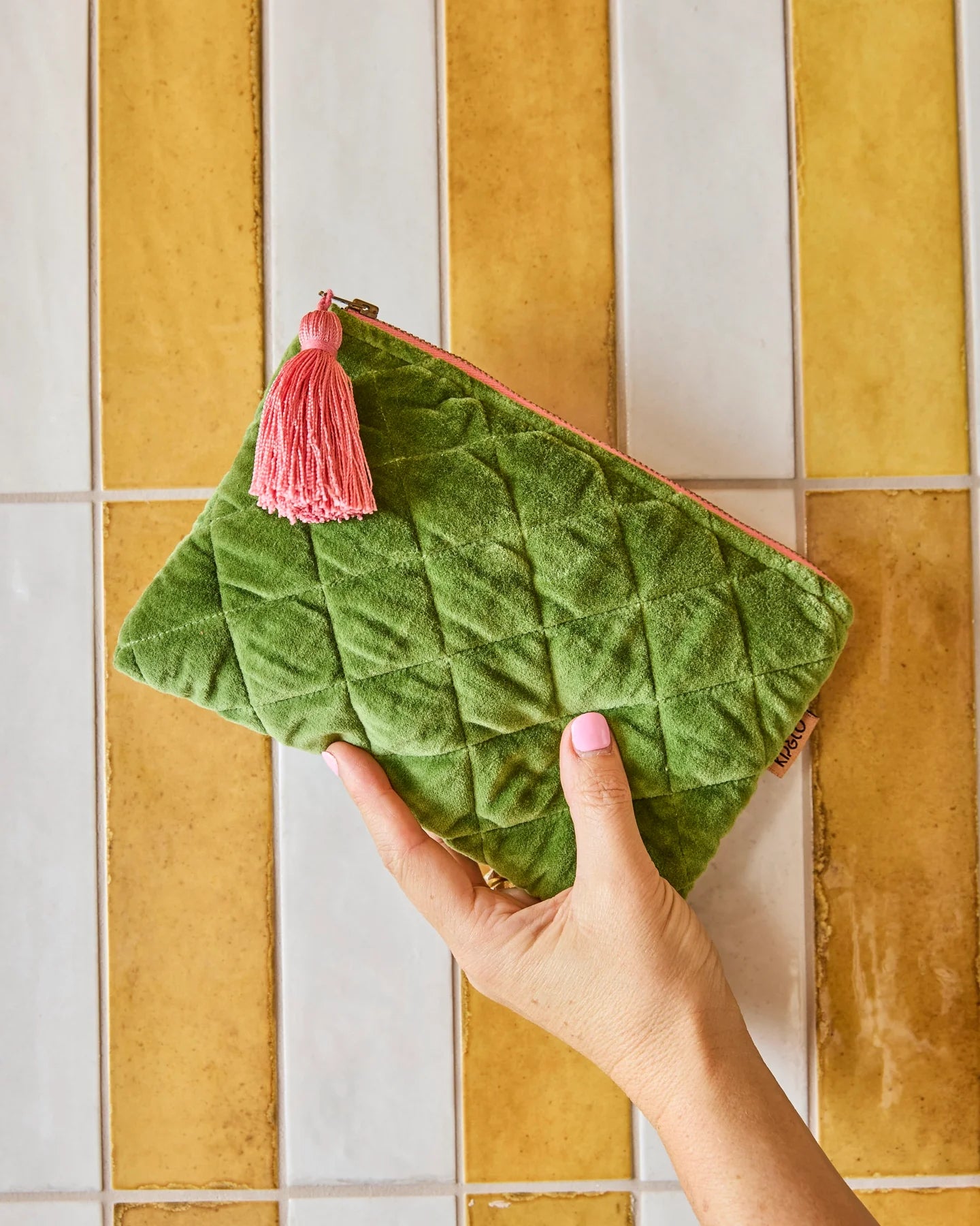 Behind The Trees - Green quilted pouch with a pink zipper and tassel on a white background - Kip & Co - Velvet Cosmetics Purse - Moss 