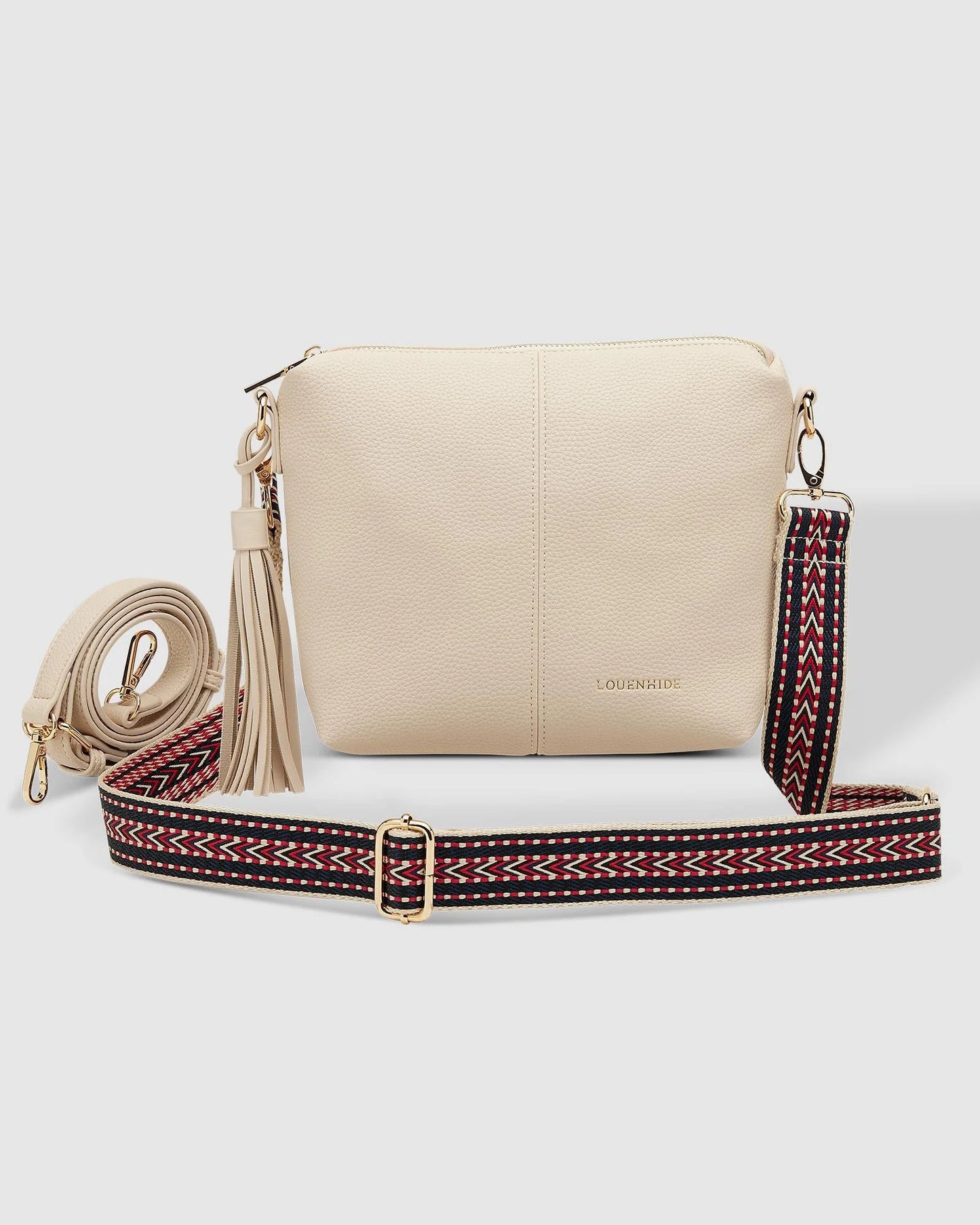Behind The Trees - Louenhide - Kasey Crossbody Bag - LinenBeige handbag with a patterned strap on a light gray background