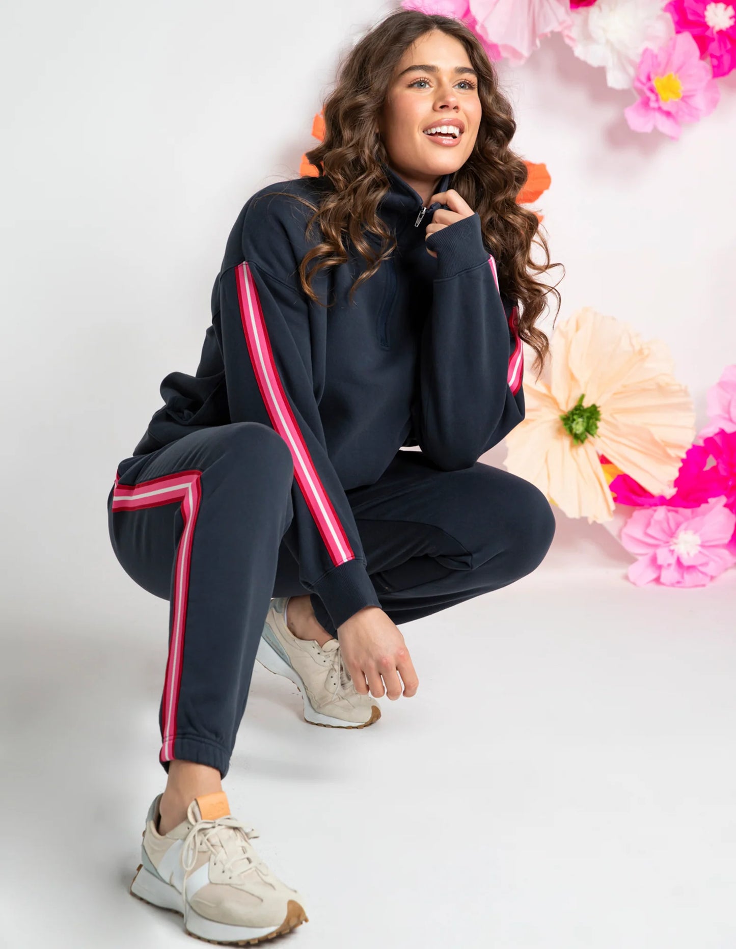 Behind The Trees- Person wearing a navy tracksuit with pink stripes on a white background-Elm - Lover- Track Pant- Navy
