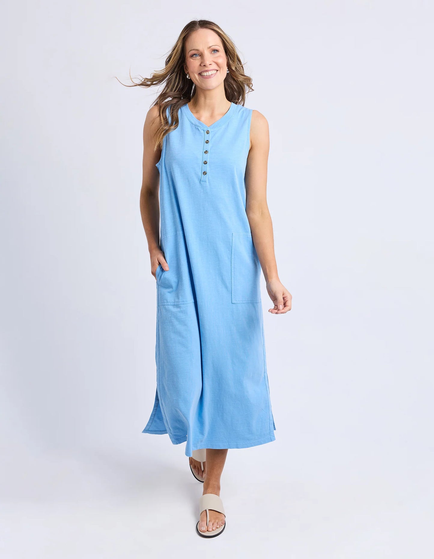 Behind The Trees - Woman wearing a blue dress on a white background - Elm - Elysian Dress - Azure Blue
