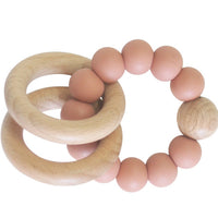 Behind The Trees - Teething ring with silicone beads and wooden rings on a white background - Alimrose - Beechwood Teether Ring Set - Assorted Colours
