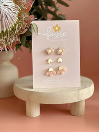 Behind The Trees - Set of floral earrings on a 'foxie collective' card with a pink background - Foxie Collective - Stud Pack trio - Pale Pink & Gold