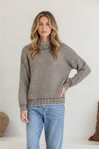 Behind The Trees - Woman wearing a striped sweater and jeans against a white background - Miss Marlow - Blanket Stitch Striped Billie Knit - Chocolate & Natural