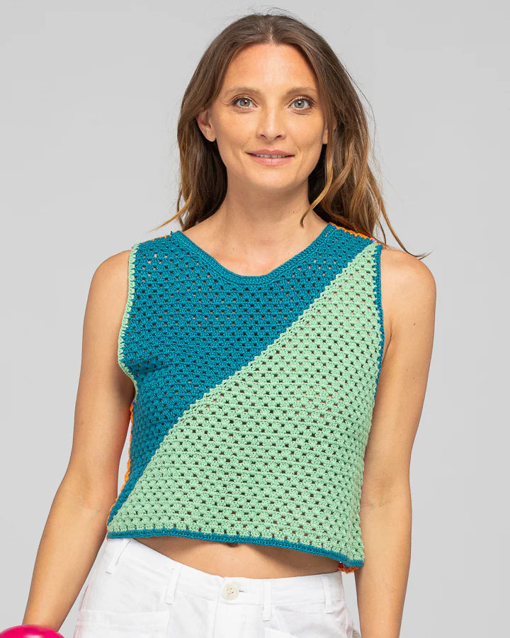 Behind The Trees - Woman wearing a colorful sleeveless top with a plain background - Boom Shankar - Riviera Top - Multi