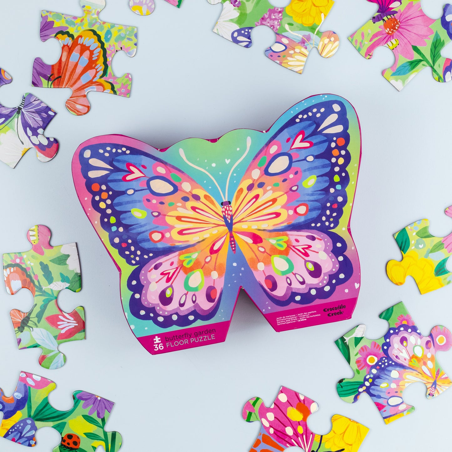 Behind The Trees - Colorful butterfly-shaped puzzle box on a white background - Tiger Tribe - Classic Floor Puzzle - 36 Pieces - Butterfly Garden