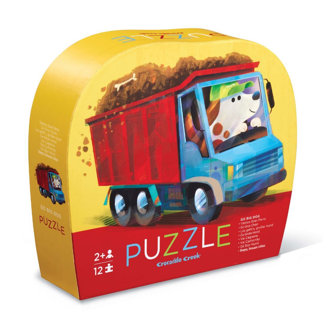 Behind The Trees - Children's puzzle packaging with a colorful truck illustration on a yellow background - Crocodile Creek - Mini Puzzle 12 pc - Go Big Dog