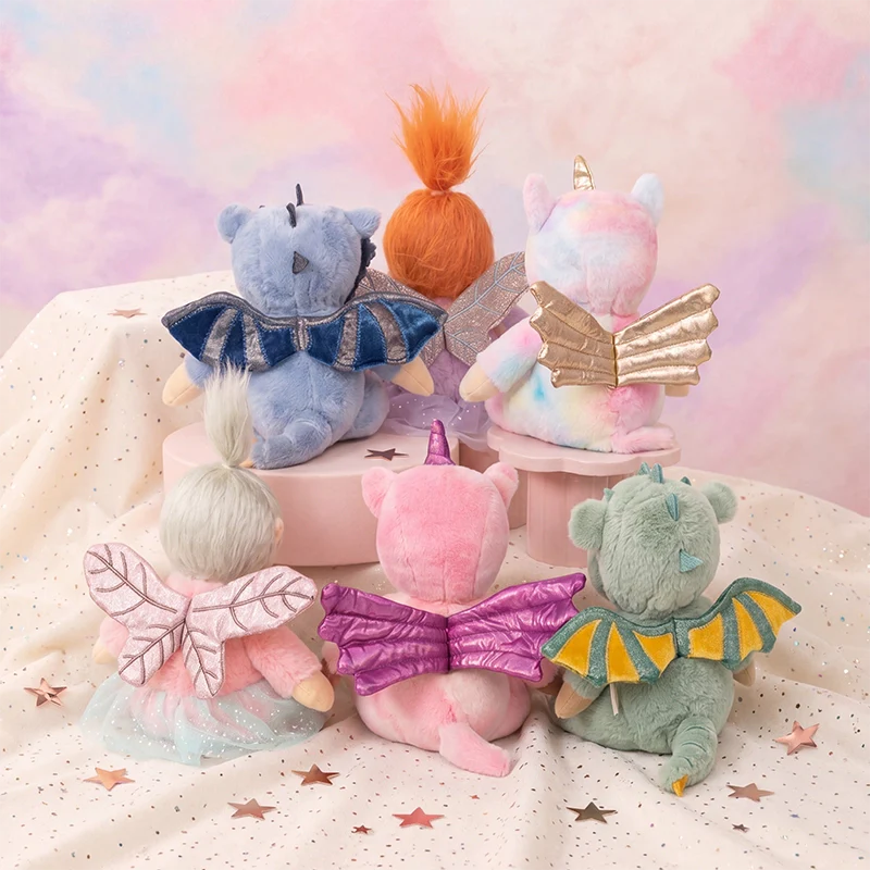 Behind The Trees - Plush toy dragon with a baby-like face on a white background - Olli Ella - Dinky Dinkum - Dax Dragon