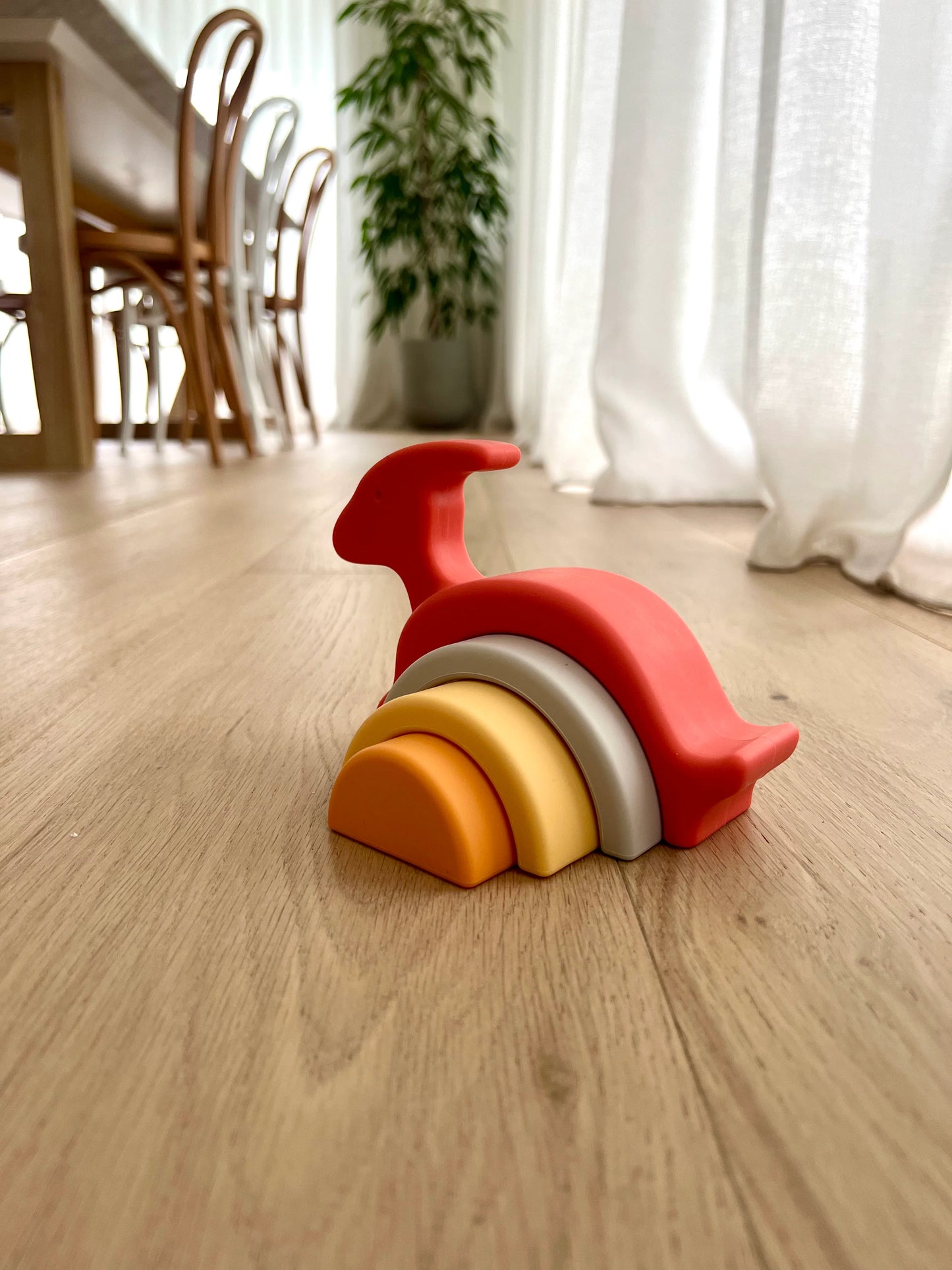 Behind The Trees - Colorful toy with a whale design on a white background m- Little Drop - Nesting Set - Pink Dinosaur