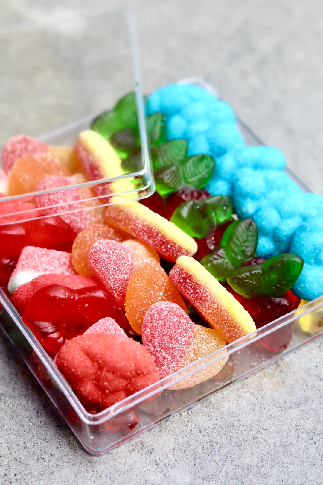 Behind The Trees - Box of colorful gummy bears with 'SWEETA' branding on a gray background - Sweeta - Fruit Salad Gummy Platter 260g