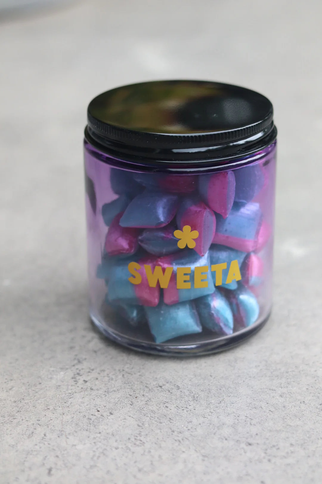 Behind The Trees - Jar of colorful candies labeled 'SWEETA' on a light surface - Sweeta - Lemonade Sherbies 180g