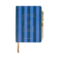 Behind The Trees - Blue striped gratitude journal with a pen on a white background- Designworks - Gratitude Journal - Grateful