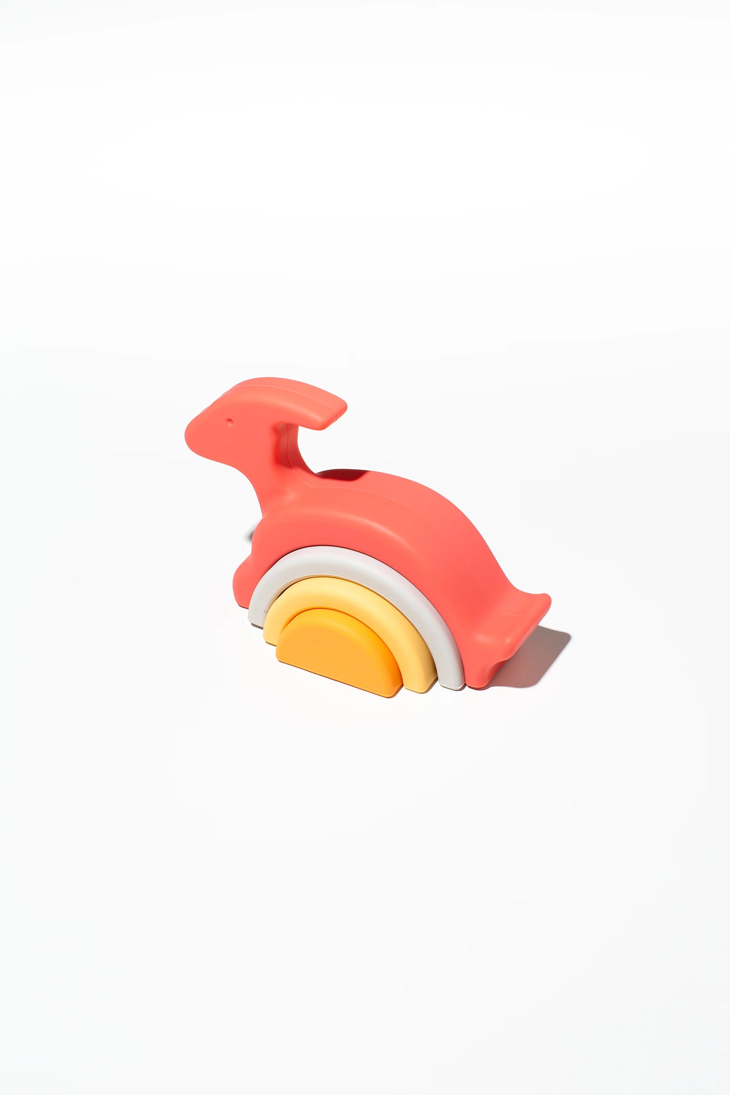 Behind The Trees - Colorful toy with a whale design on a white background m- Little Drop - Nesting Set - Pink Dinosaur
