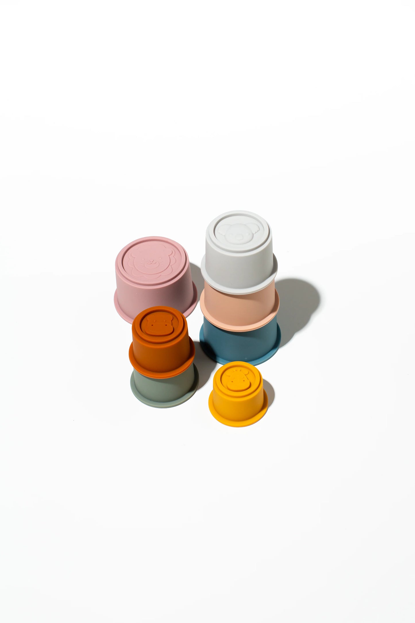 Behind The Trees - Set of colorful cylindrical containers on a white background - Little Drop - Animal Farm Stackers