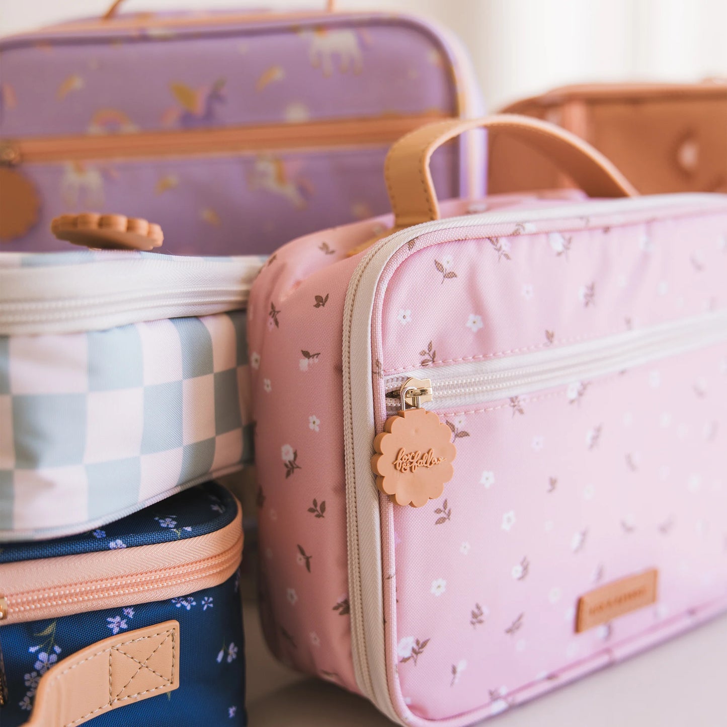 Behind The Trees - Pink floral-patterned lunch bag with a handle on a light pink background - Fox & Fallow - Mini Lunch Bag - Dusty Roses