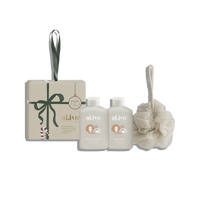 Behind The Trees - Set of 'alive' skincare products including bottles and a bath pouf on a white background - Al. Ive - Baby Care Ornament - Calming Oatmeal
