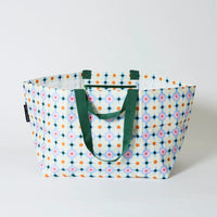 Behind The Trees - Colorful patterned tote bag with green handles on a white background - Project Ten - Oversized Tote - Daisy