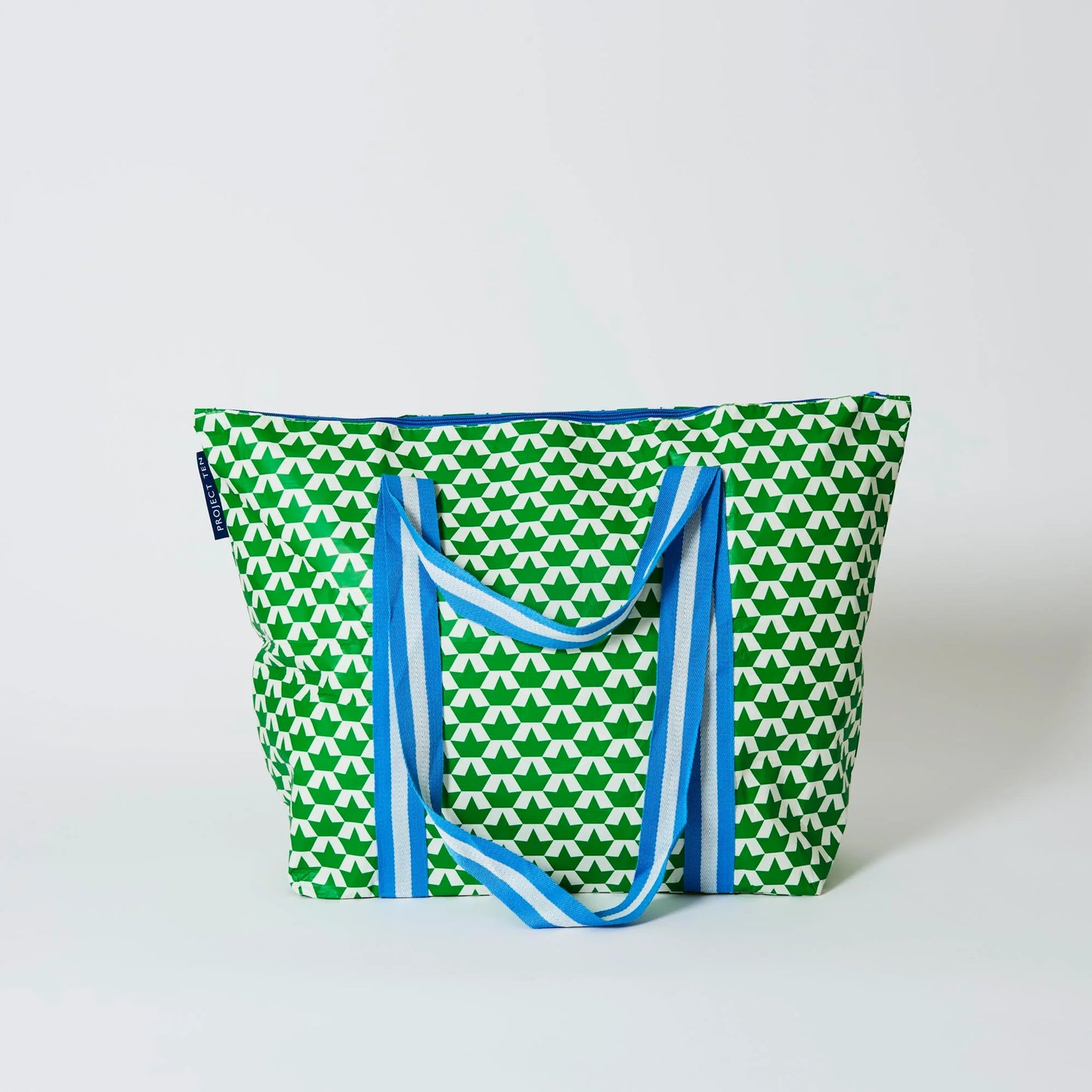 Behind The Trees - Green tote bag with white pattern and blue accents on a light gray background - Project Ten - Zip Medium Insulated Tote - Boats