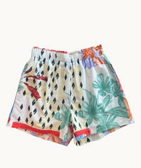 Behind The Trees - Colorful shorts with tropical leaf pattern on a white background - Little Lies - Solace Shorts 
