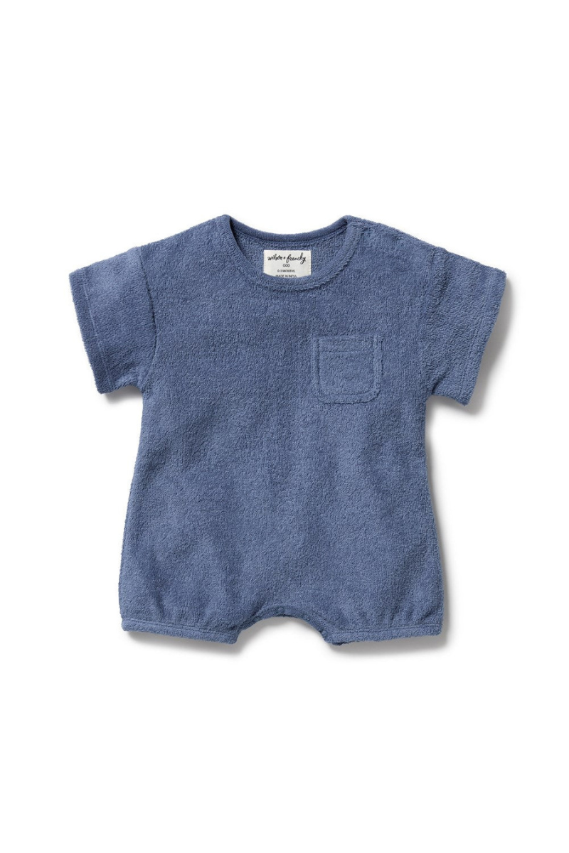 Behind The Trees - Blue baby romper with a pocket on a white background - Wilson + Frenchy - Organic Terry Growsuit - Deep Blue