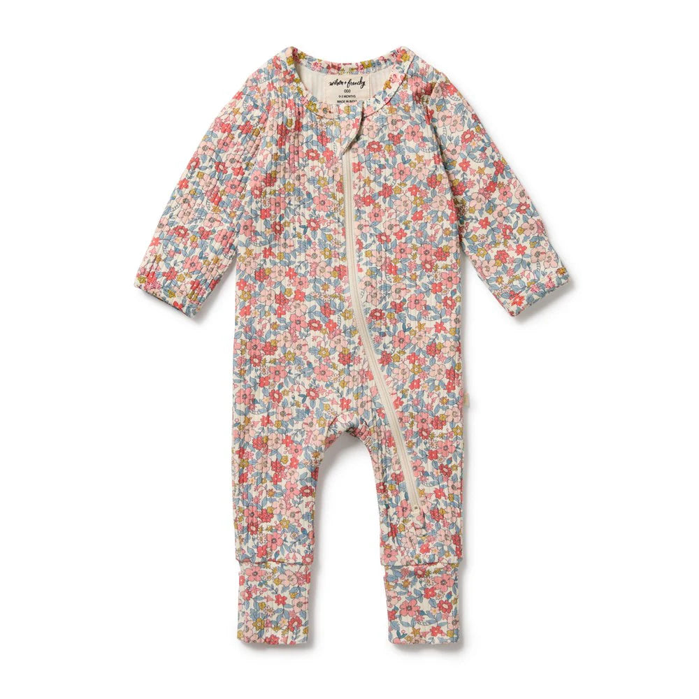 Behind The Trees - Floral patterned baby onesie on a white background - Wilson + Frenchy - Organic Zipsuit With Feet - Summer Bloom