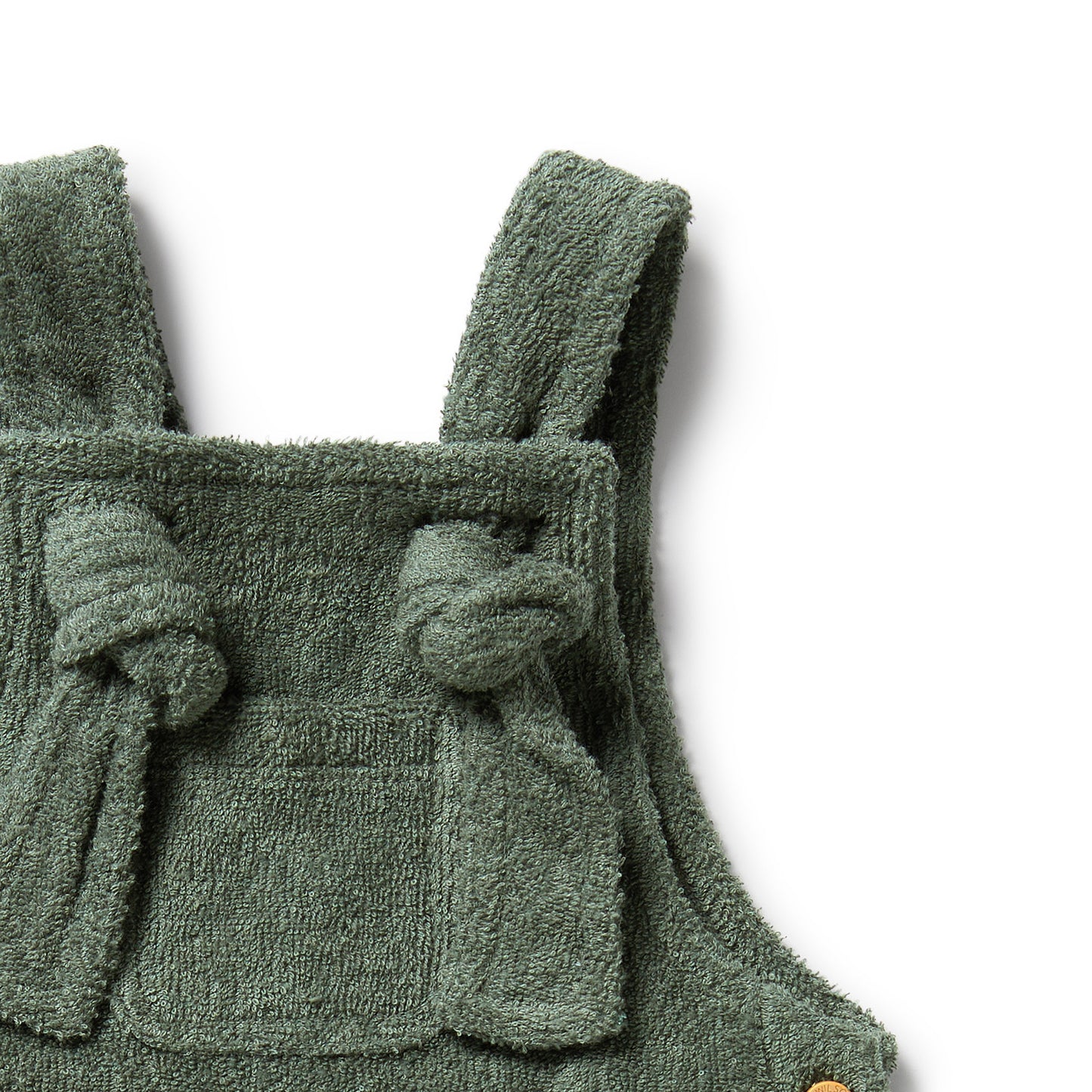 Behind The Trees - Green baby romper with bow straps on a white background - Wilson + Frenchy - Organic Terry Overall - Moss
