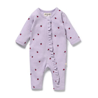 Behind The Trees - Purple baby onesie with red apple pattern on a white background - Wilson + Frenchy - Organic Waffle Ruffle Zipsuit - Berry Plums