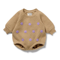 Behind The Trees - Beige baby sweater with purple polka dots on a white background - Wilson + Frenchy - Organic Knitted Bubble Bodysuit - Oat and Mulberry 