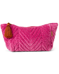 Behind The Trees - Pink quilted pouch with a tassel on a white background - Kip & Co - Velvet Toiletry Bag - Pink