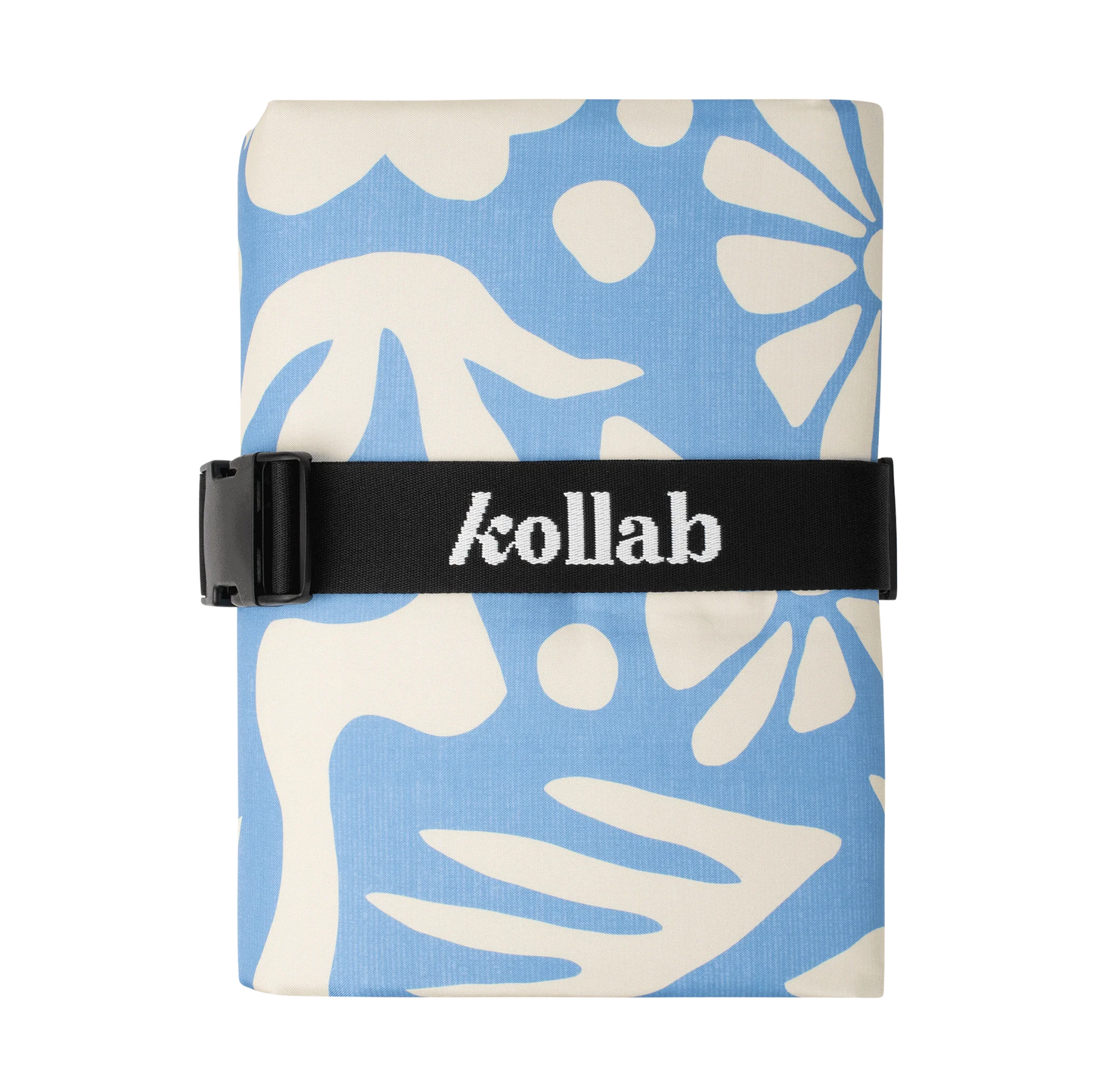 Behind The Trees - Folded towel with blue and white leaf pattern and 'kollab' branding on a black strap. - Kollab - Picnic Mat - Butter Blue
