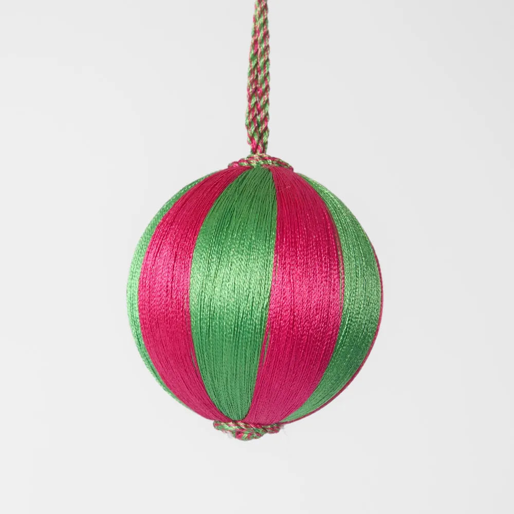 Behind The Trees - Decorative ball with pink and green stripes on a white background - Florabelle Living - Silk Stripe Bauble Small  - Pink & Green - Christmas Decorations