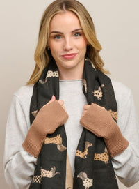Behind The Trees - Woman wearing a black scarf with dog patterns and brown gloves against a beige background - Tiger Tree - Fingerless Ribbed Mittens - Mocha