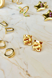 Behind The Trees - Gold rings on a marble surface Mosk.Melbourne - Gold Scrunch Studs