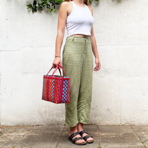 <p>&nbsp;</p> <p>Behind The Trees - Pāli Baskets - Market Baskets - Small - Assorted Colours - market baskets - colourful handmade baskets - recycled baskets</p>